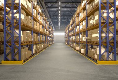 Large industrial warehouse storage facility with tall organized pallet racks